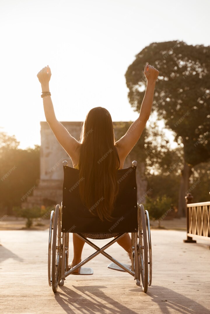A woman with disability celebrating